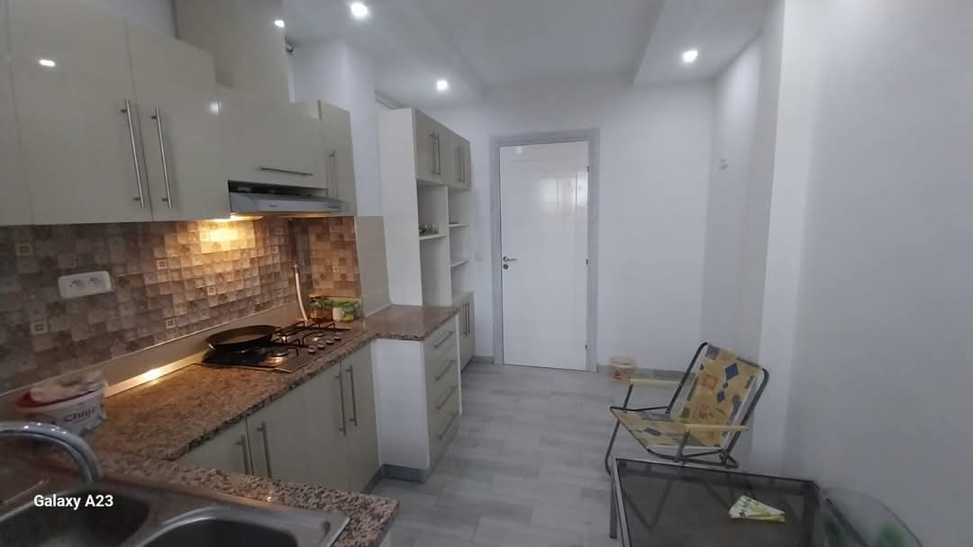 Un appartement s plus 3 au rdc